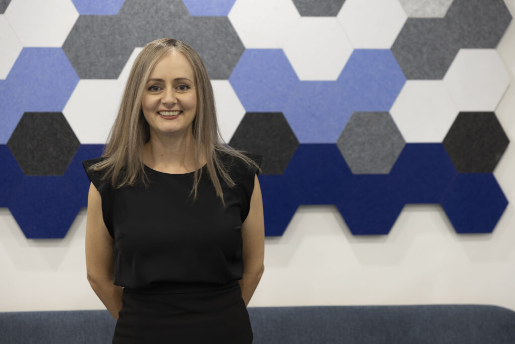 Danielle Long standing in Fine Orthodontist Sydney Bondi Junction clinic.